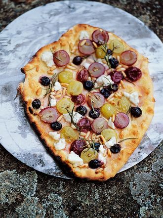 Green and red grapes, rosemary, pine nuts and ricotta pizza topping