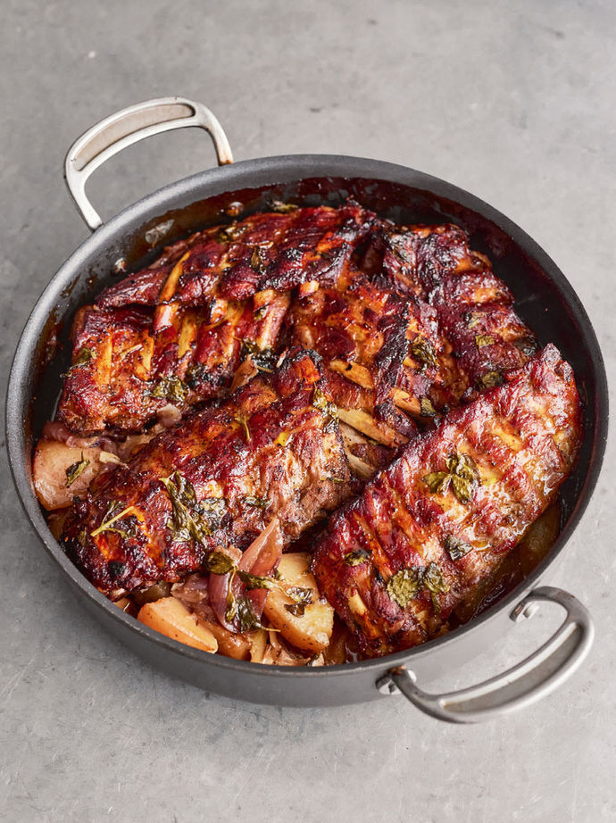 One pan with pork ribs in a marinade