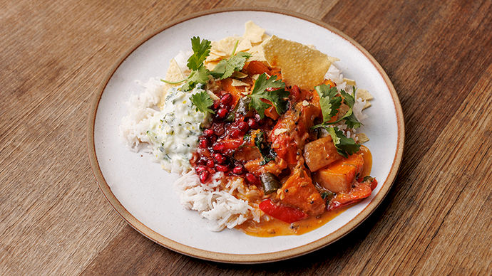 Jamie's squash curry for YesChef, topped with coriander and served with fluffy rice